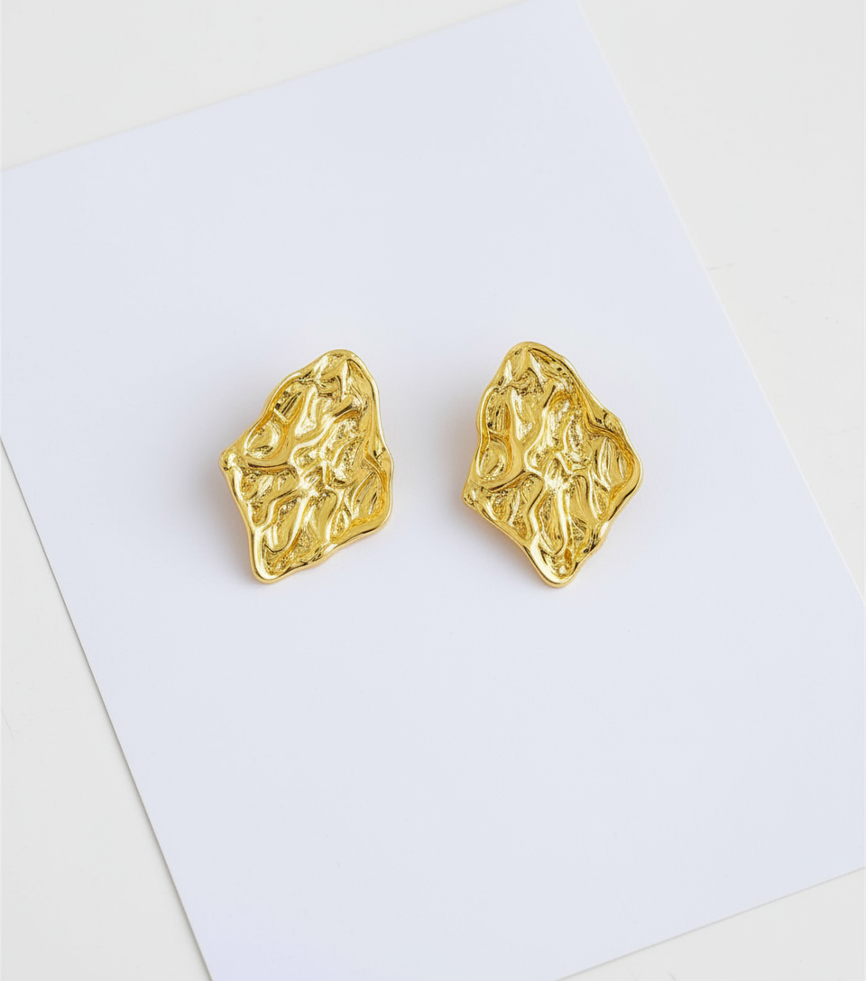 Gold ripple earring